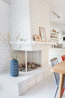 An old fireplace was turned into a little rock garden.