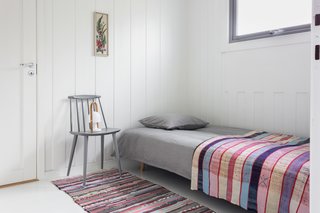 A transit room with a sofa bed.