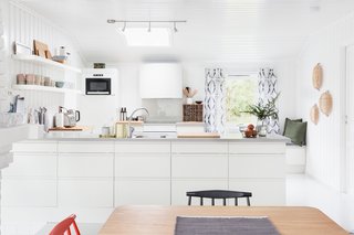 An expansive skylight brightens the kitchen.