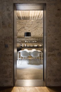 A narrow doorway evokes the warren-like feel of the original layout.