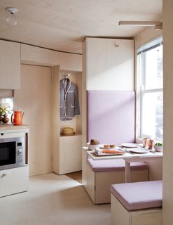 10 Things You Should Know Before Moving Into a Tiny Home - Photo 12 of 20 - A breakfast booth looks out to the street.