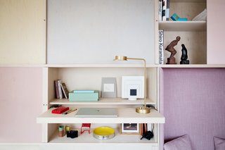 Technical equipment is hidden below this furniture unit.
