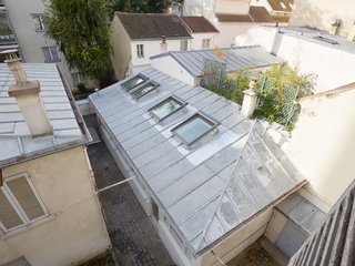 Before and After: A Renovated Artist's Studio Is Now an Airy, Efficient Home - Photo 6 of 16 - Four aluminum-framed skylights were created on the building's original roof.