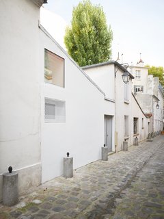 Before and After: A Renovated Artist's Studio Is Now an Airy, Efficient Home - Photo 3 of 16 - The entrance to the apartment faces the street.