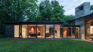 The secluded site allows the design to focus on a high level of transparency.
