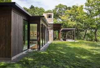 A patio with a pergola is accessible via the living room.