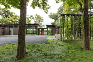The mirror-clad shed gives the property a sense of constant movement.