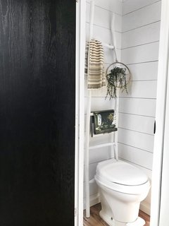 The walls of the bathroom were also painted white.