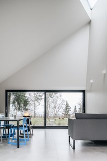 This Forest Retreat Is a Modern Take on the Traditional Estonian Hut - Photo 7 of 12 - The sloping ceiling creates a varied sense of space within each cabin.