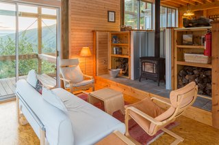 A wood-burning stove keeps the living room extra-warm and cozy in winter.