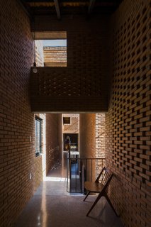 Light and Shadow Help Shape This Modern Brick House in Vietnam - Photo 13 of 15 - The house employs "open architecture" and passive cooling techniques.