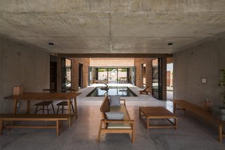 Light and Shadow Help Shape This Modern Brick House in Vietnam - Photo 3 of 15 - Plenty of interior and exterior apertures bring in light and cool breezes.