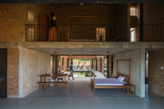 Light and Shadow Help Shape This Modern Brick House in Vietnam - Photo 8 of 15 - The simple interior furnishings leave plenty of space for movement.