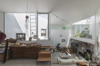 The house has two sun-drenched rooftop terraces.