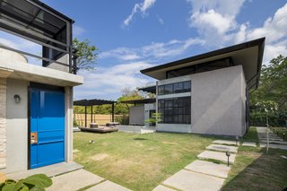 A Concrete Abode Becomes a Surfer's Paradise - Photo 13 of 23 - There are numerous garden spaces surrounding the buildings.
