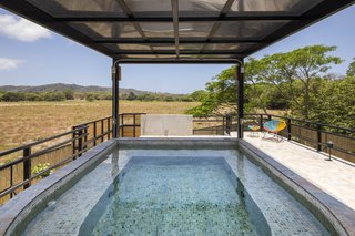 A Concrete Abode Becomes a Surfer's Paradise - Photo 16 of 23 - A plunge pool on the roof of the small building makes for a great place to rest and unwind.