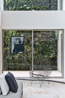A look at one of the painting that hangs on the glass wall.