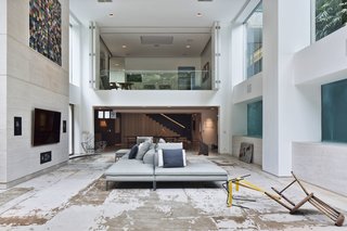 The furniture has been selected to complement the artwork around the duplex.