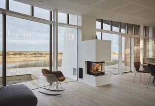 This vacation villa is integrated into nature and is surrounded by sand dunes and heathlands.