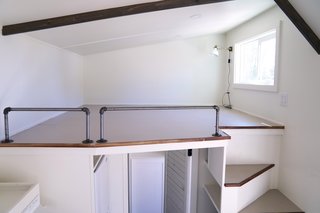 The sleeping loft is large enough to accommodate a king size bed, if desired.