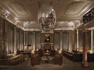 Eclectic art and well-selected contemporary banquettes and chairs harmonize with regal British and European design elements in the Lobby Bar.