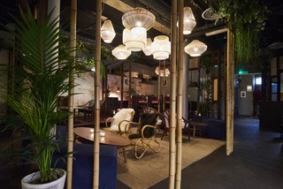 Here, rattan chairs, Asian-style lantern pendant lamps, and vines hanging from the ceilings make patrons feel like they’ve exited London and entered a faraway land. 