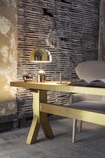 Layering lighting can be an impactful way to change the feel of your home. Bring in a statement floor or table lamp to shake things up.