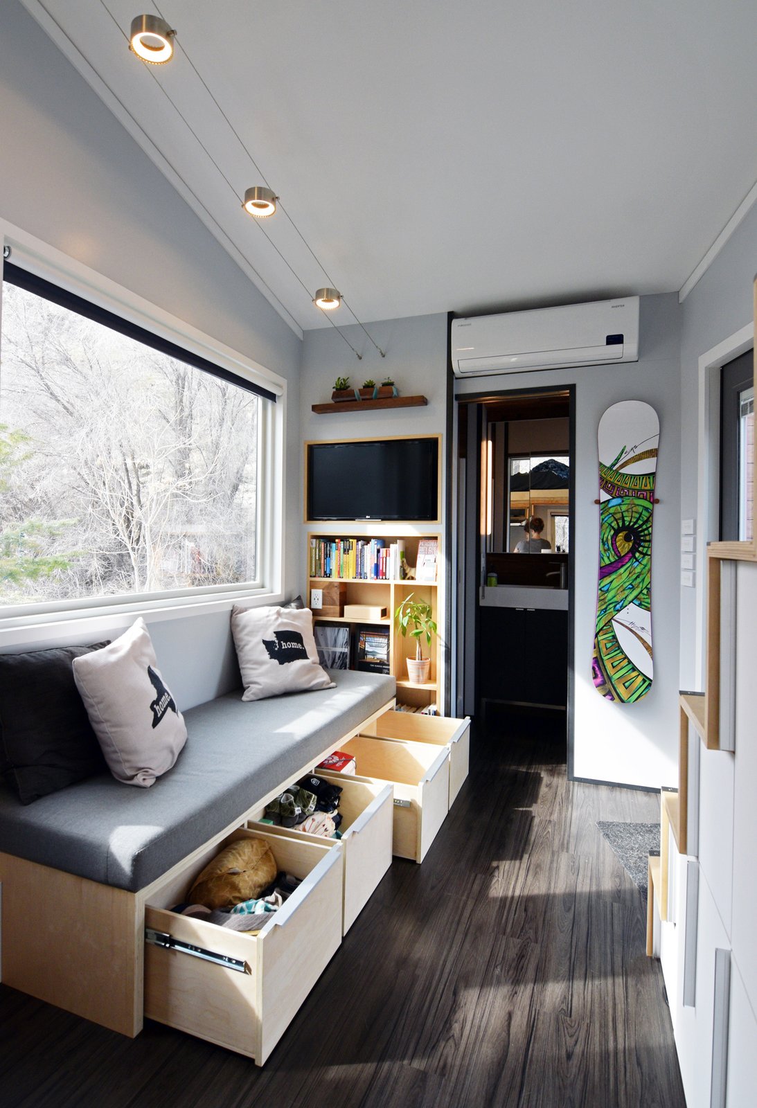 “The seven foot long couch is more than adequate for use as an extra sleeping surface and all five of the stair steps are a great location to sit, often times with make shift pillow cushions taken from the couch,” says Robert.