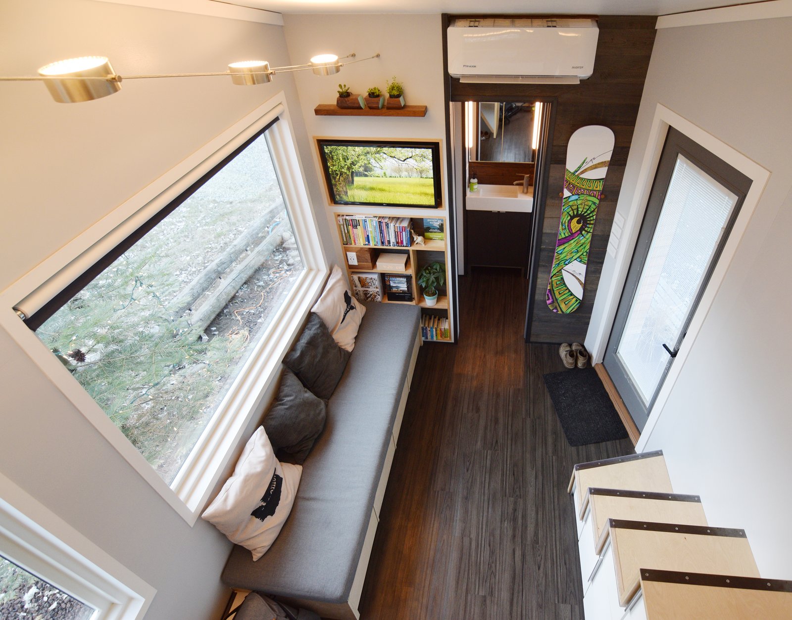 A view of the living area from the loft sleeping space.