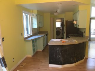 To solve the problem of a cramped kitchen, the team came up with plans for a very functional kitchen built to the style that Suraya had provided in pictures.