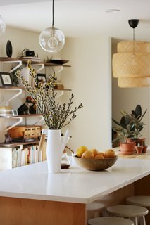 Suraya provided His Builders with reference images for the look and feel she wanted for the new kitchen. One of her requirements was for a versatile island. 