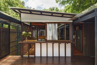 The vertical Japanese slat details imbue the house with a Zen-inspired aesthetic.