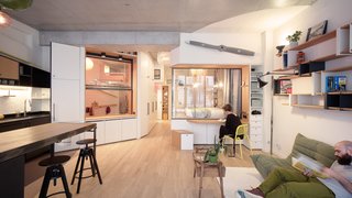 The concrete ceilings and beams from the original garage were left in tact during the renovation to pay homage to the character of the original garage.