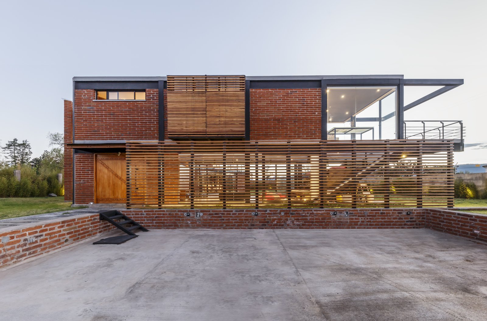 A wooden screen provides privacy, and offers protection from the strong midday sun.