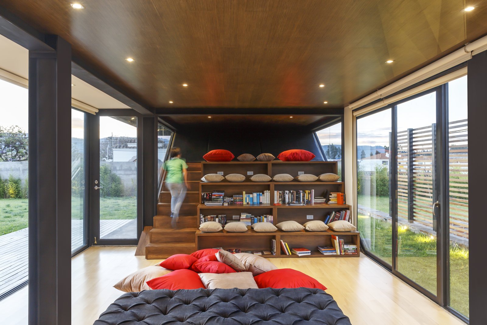 A stepped library and lounge area.