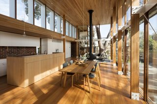 An Airy New Pavilion Lets One Family Practically Live in a Park - Photo 4 of 9 - The interiors were reworked into a split-level, open-plan living space that helps the residents feel connected to the park.