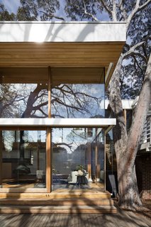 An Airy New Pavilion Lets One Family Practically Live in a Park - Photo 8 of 9 - Exposed clinker brick-and-steel bracing convey the pragmatism of Australian midcentury design.