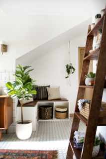 Another DIY project was the leaning shelf. "I needed a little extra storage for towels and knick knacks, and this shelf is the perfect functional-yet-stylish solution," she explains. 