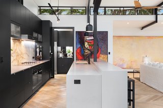 The kitchen includes a generous butler’s pantry with Libeherr refrigerators.