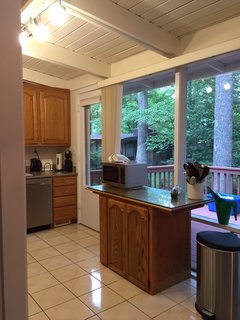 The small island in the original kitchen does not encourage frequent use.