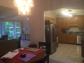 Originally, the 1980s-style kitchen had country oak cabinets and dated finishes, and the layout wasn’t functional. 