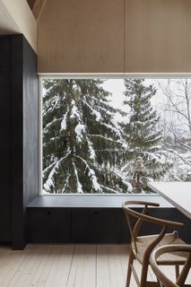 A large window affords views of the environment.