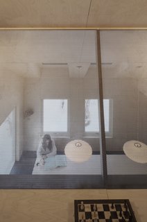  "The loft is deliberately made dark. When you are in the dark, but close to something bright, your focus goes away from your own situation towards that bright situation," says Austigard.