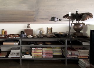 "The structural system allowed the interior volume to be completely empty, creating a pure skin that helps to accentuate the white box containing the service elements and the loft space above," says Suyama. 