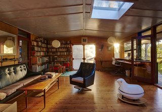 The storage unit in the revised cabin floats above floor level.