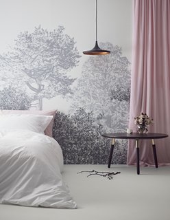 Here, Sian Zeng's Hua Trees Mural in a lovely gray shade is used in a hotel bedroom.