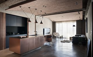 The open-plan kitchen flows seamlessly into the living area.
