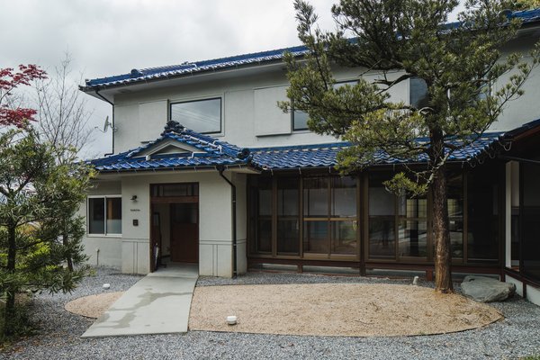 The facade of the house in Ritto maintains traditional elements.