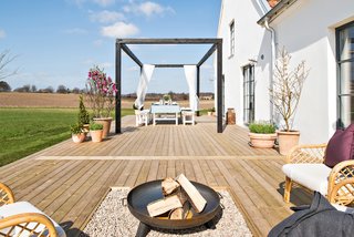 There is a large, open patio on the exterior that is perfect for entertaining.