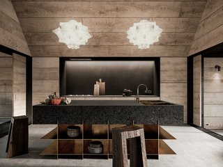 The taraxacum suspended lights are by Achille and Pier Giacomo Castiglioni. The stools are by Fritz Baumann. 